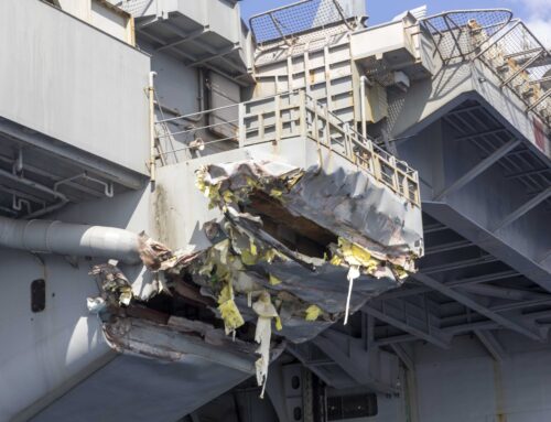 Navy relieves captain of carrier that hit merchant vessel